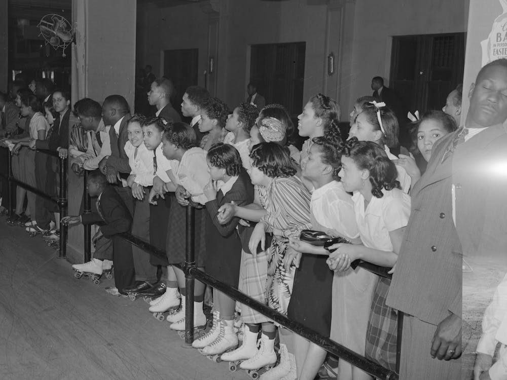 Crowds Watching Rollerskating Exhibition, Chicago, Illinois By Russell Lee