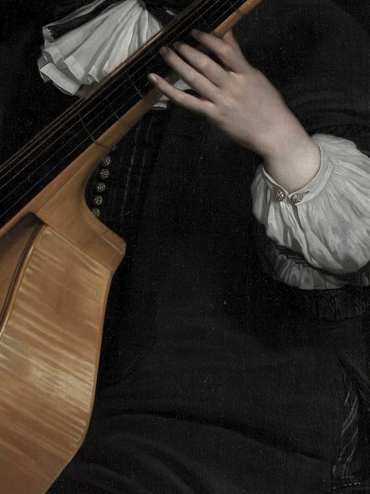 Man Playing A Guitar