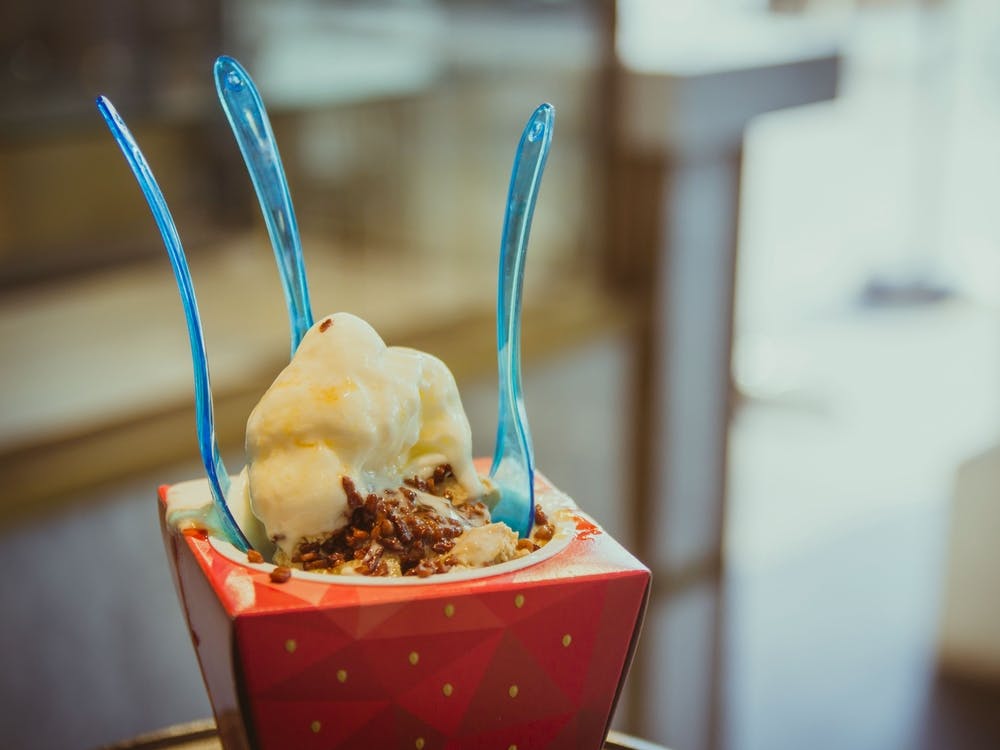 Yogurt With Chocolate Chips In A Red Cup