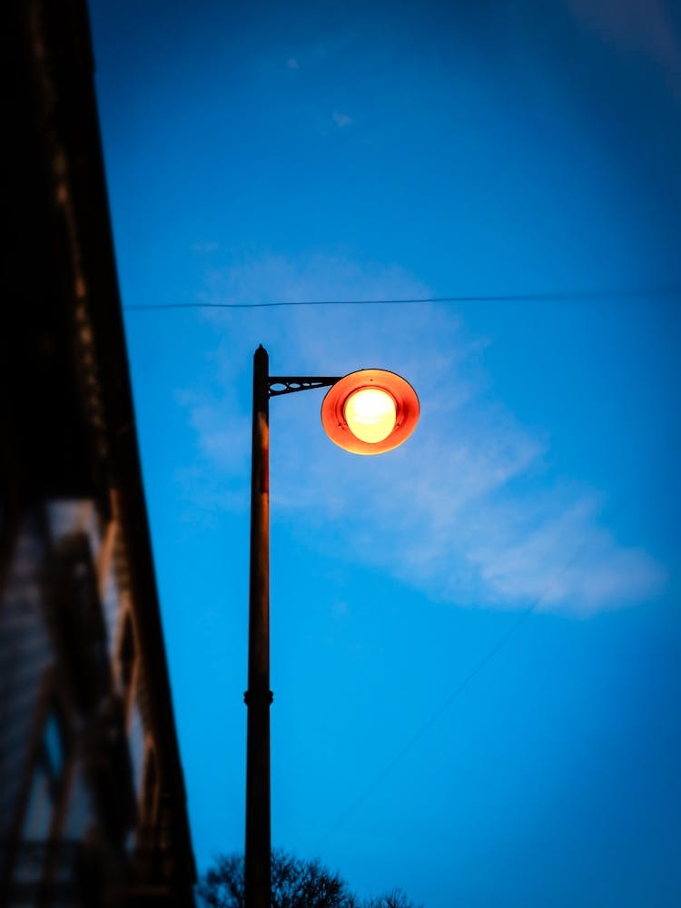 Urban Street Lamp At Dusk