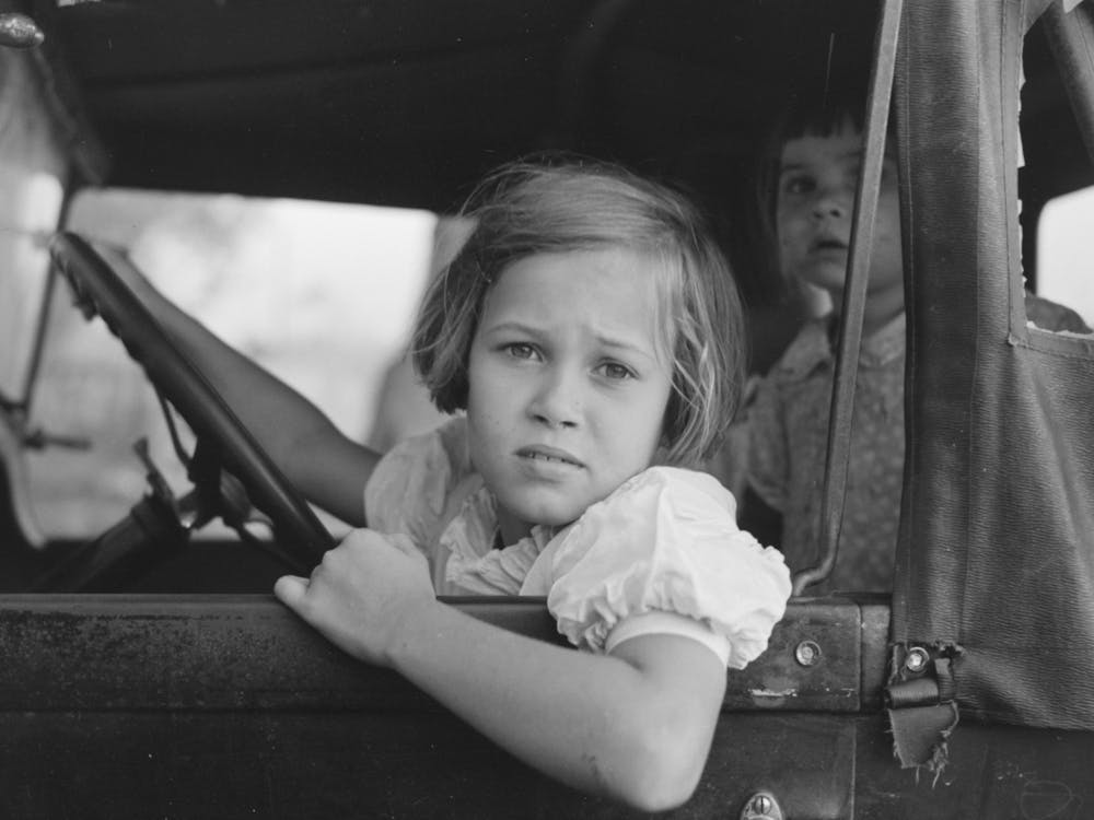 Untitled Photo, Possibly Related To Child Of Farmer Sitting In Automobile Waiting For Father To Come Out Of General