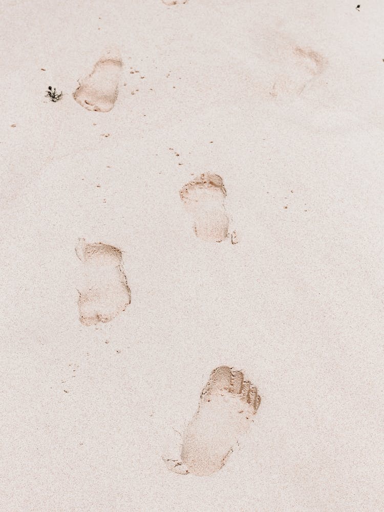 Foot Prints In The Sand