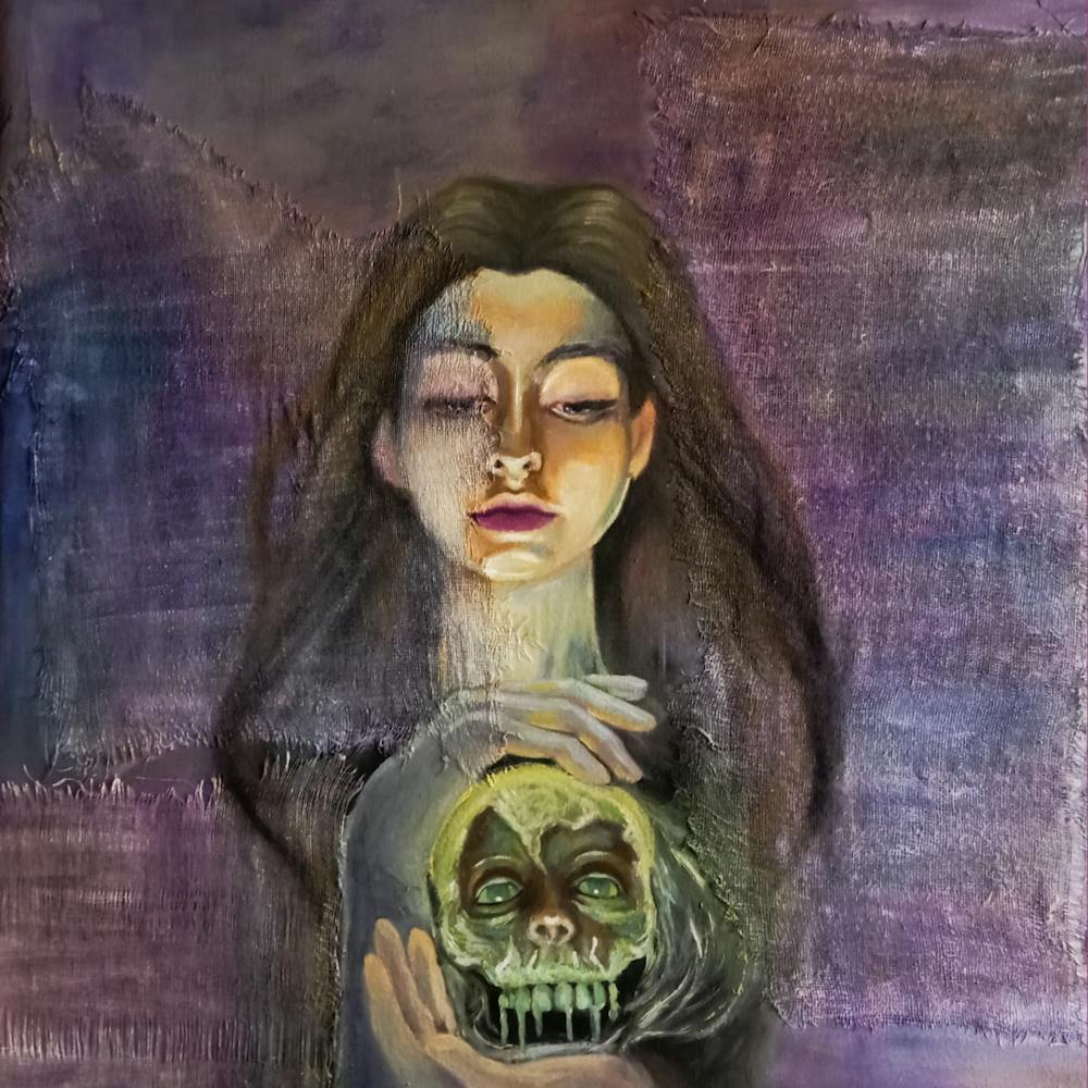 Femme tenant un crâne