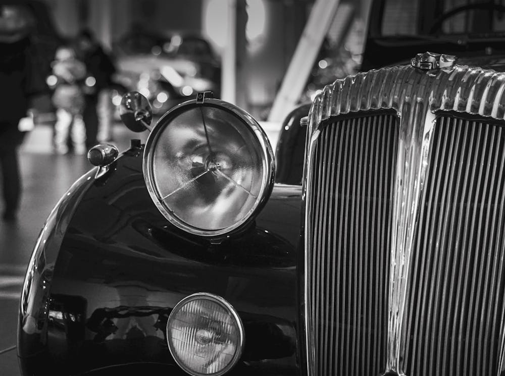 Black And White Photograph Of An Old Car