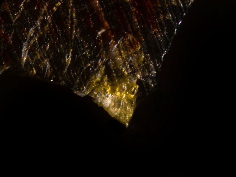 Extreme Closeup Of A Knife Under The Microscope