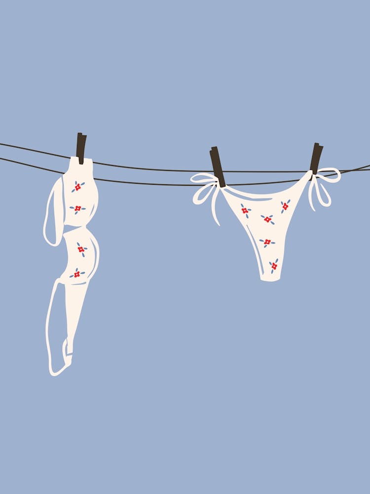 Blue Bikini Hanging On Clothesline