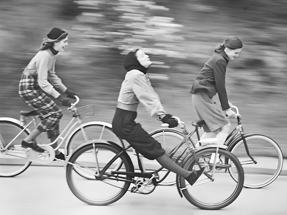 Bicycle Riders Vintage Black and White Photo