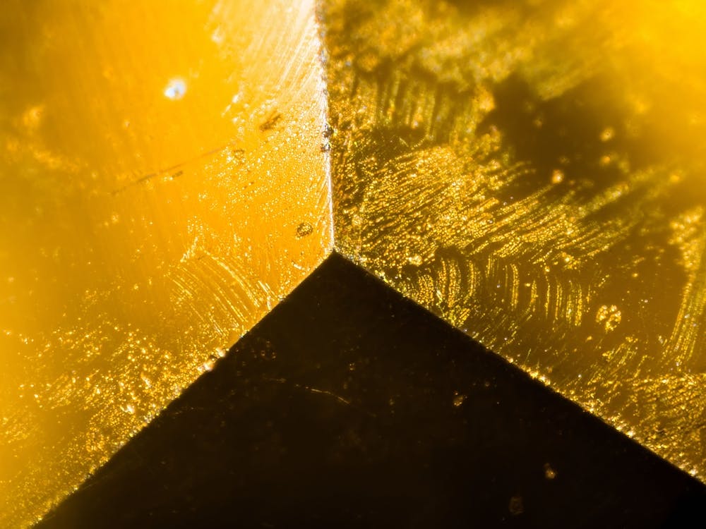 Yellow Gem Under The Microscope 1