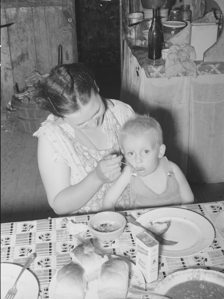 Wife Of Unemployed Oil Worker Feeding Her Baby, Seminole, Oklahoma By Russell Lee