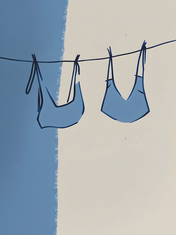 Two Bikinis Hanging On A Line
