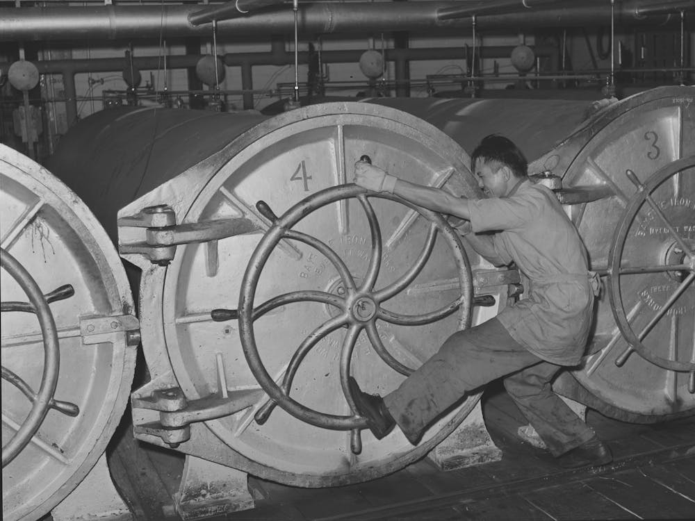 Closing Ovens In Which Canned Salmon Is Cooked, Columbia River Packing Association, Astoria, Oregon By Russell