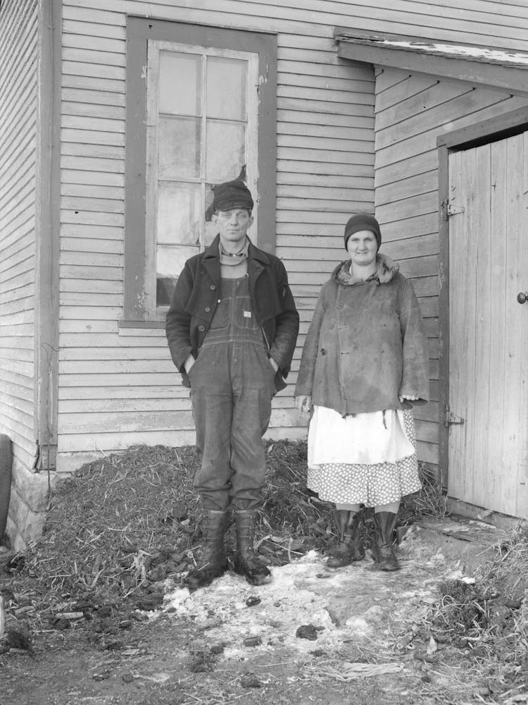 Edgar Allen And His Wife At The Rear Of House On Farm Near Milford, Iowa By Russell Lee