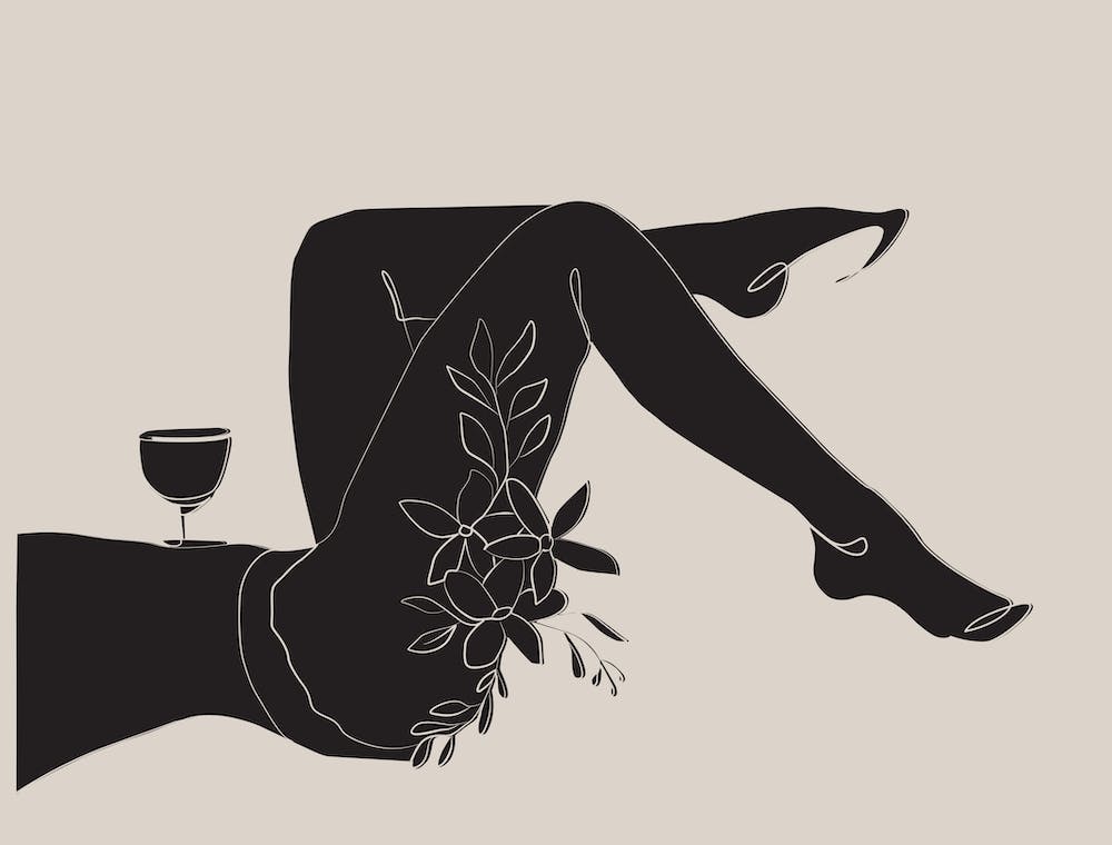 Woman With A Glass Of Wine