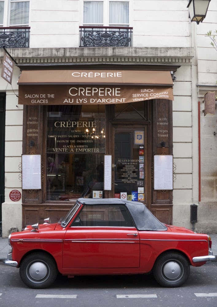 Red Autobianchi Outside Creperie In Paris