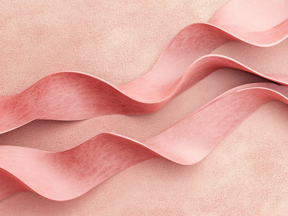 Pink Ribbons On A Pink Background