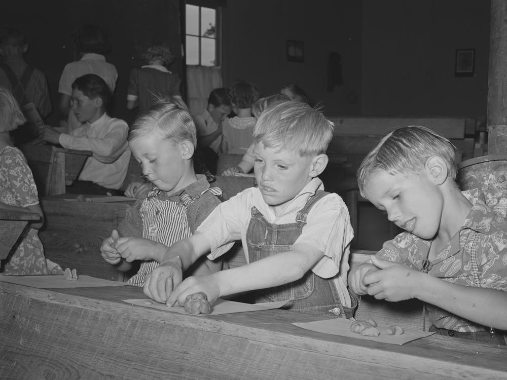 Youngsters Modeling In Clay At The Private School In The Farm Bureau Building, Pie Town, New Mexico By
