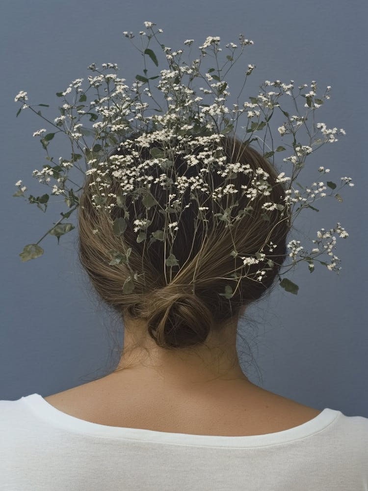 Flowers On A Woman'S Head