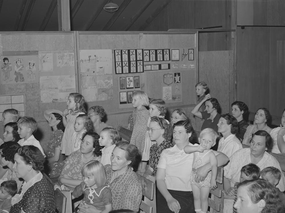 Mothers And Children Watching Program By Schoolchildren At End Of Term, Fsa (Farm Security Administration) Labor