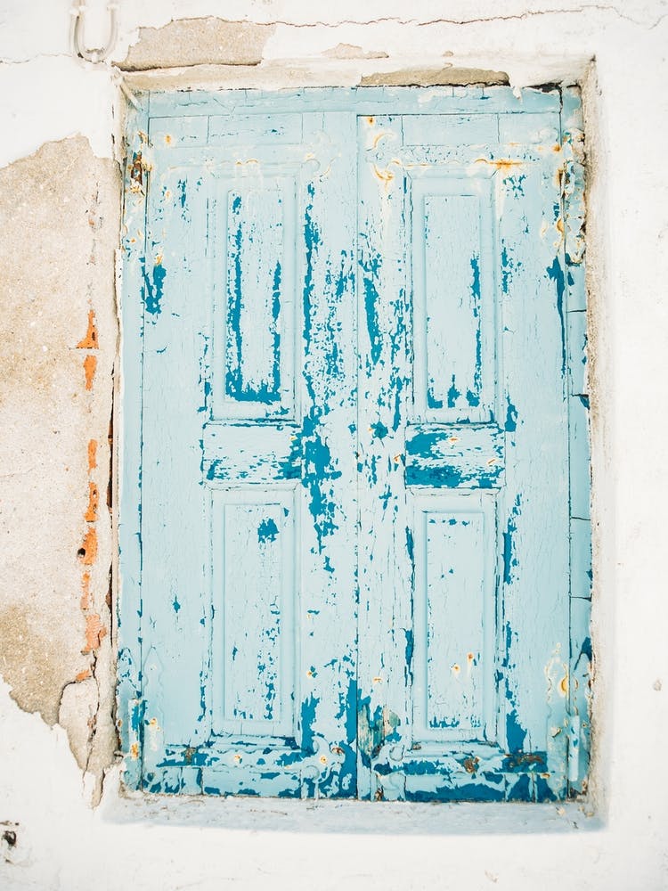 Abgenutztes Blaues Fenster