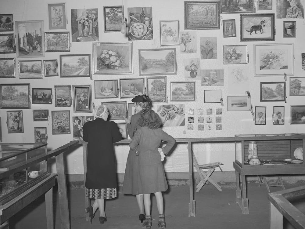 Looking At An Art Exhibit At The County Fair, Gonzales, Texas By Russell Lee