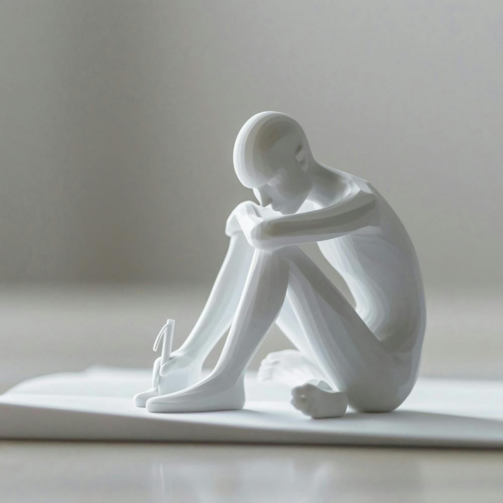 Person Sitting On Paper