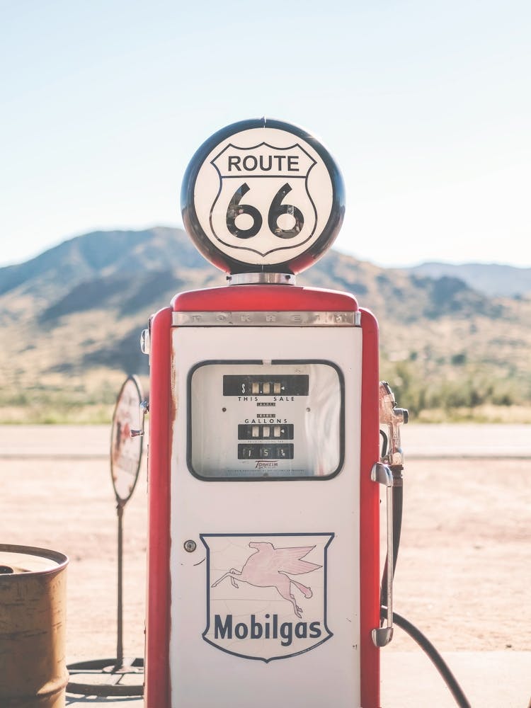 Route 66, USA I Deep America vintage retro gas pump photography in front of Arizona California road landscape to pastel aesthetic of summer under the sun of a stopover at the gas station during a road trip