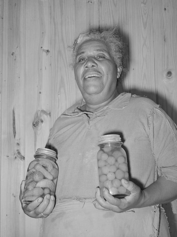Wife Of Fsa (Farm Security Administration) Client With Home Canned Vegetables, Sabine Farms, Marshall,