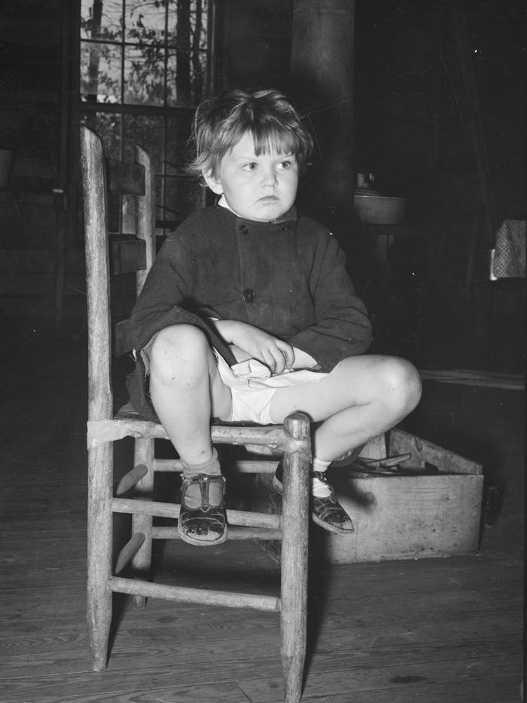 Child Of Family Living In Abandoned Church Near Laurel, Mississippi By Russell Lee