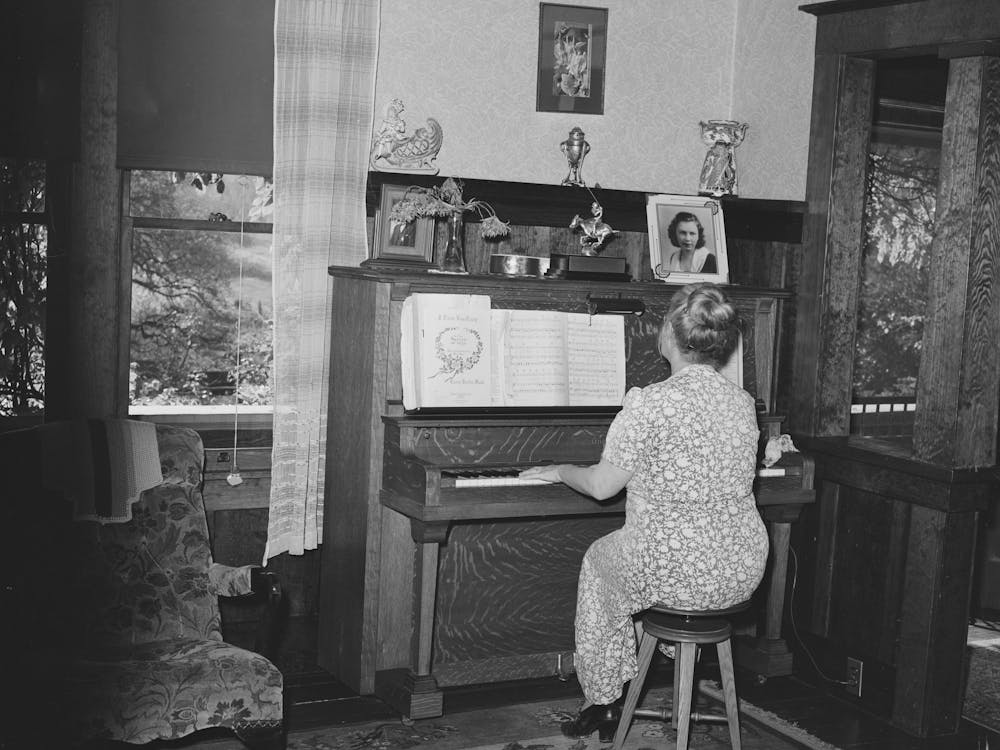Fruit Farmer S Wife Playing Piano, Placer County, California, Because They Have Not Changed The Variety Of Plums And