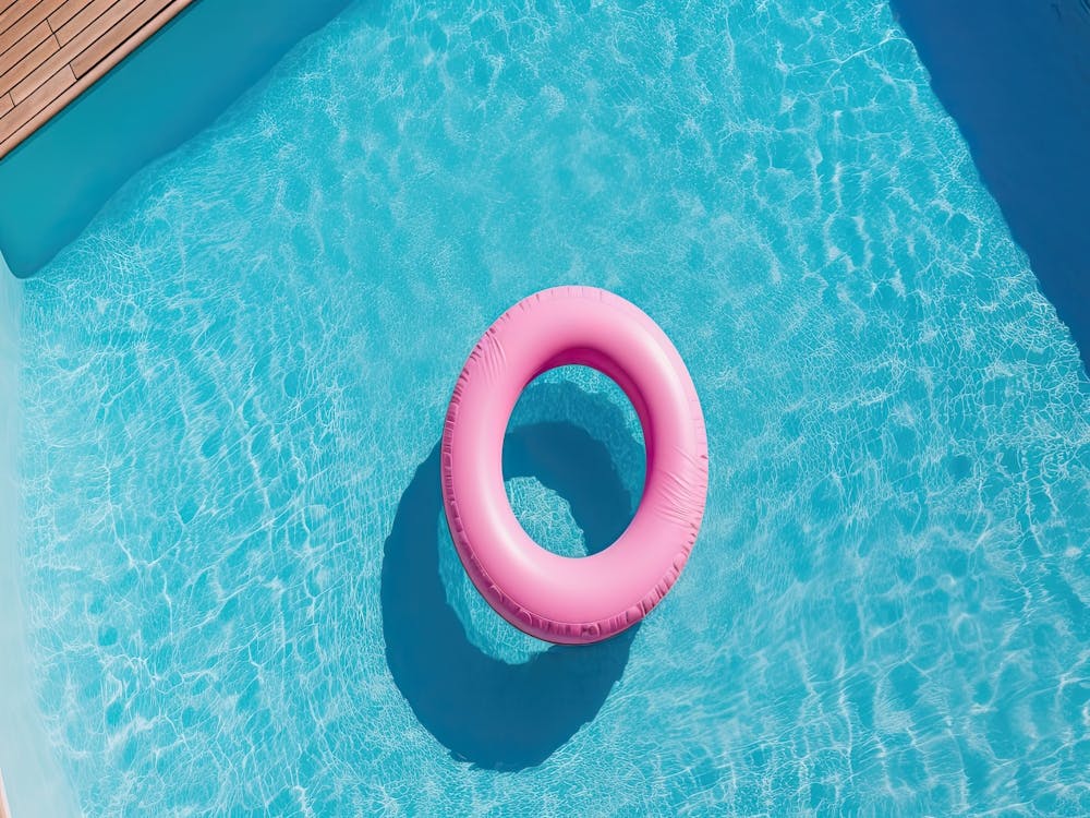 Swimming Pool And Pink Donut