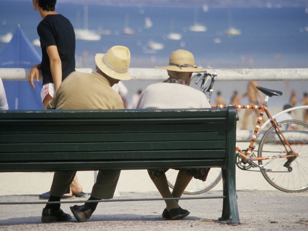 Retired Couple On The Promenade Brittany France