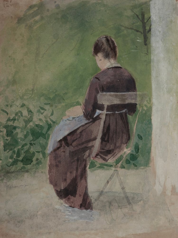 Woman Sitting In A Chair