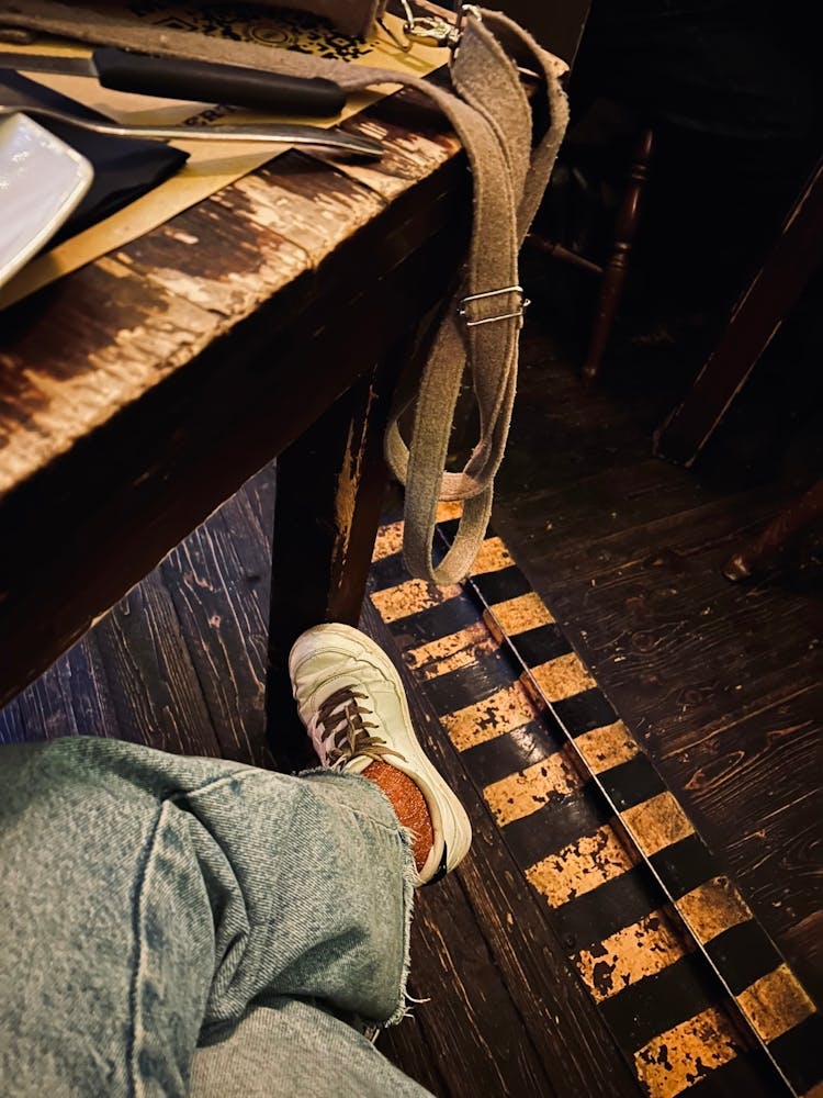 Man Sitting At A Table