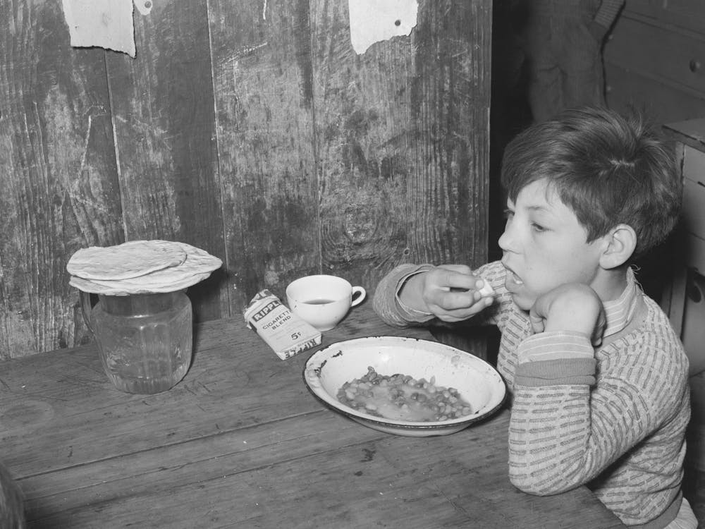 Mexican Boy Eating Lunch, San Antonio, Texas By Russell Lee 1
