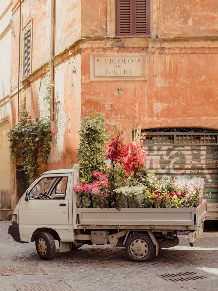 Rome Cute Van With Lots Of Flowers