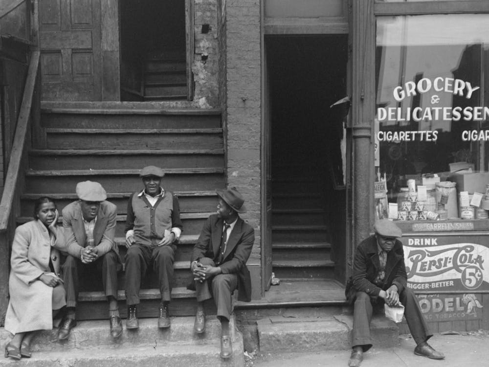 People Sitting On Front Porches In Section Of Chicago, Illinois By Russell Lee