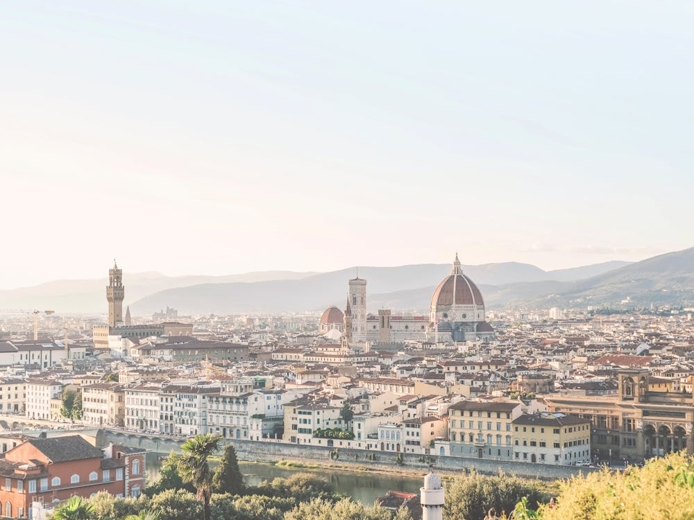 Florence, Italy I Pastel panorama photography of the city on the Duomo Santa Maria by the sunset light in summer vintage aesthetic with views of Tuscany countryside, cypress trees, the Arno river and mountains