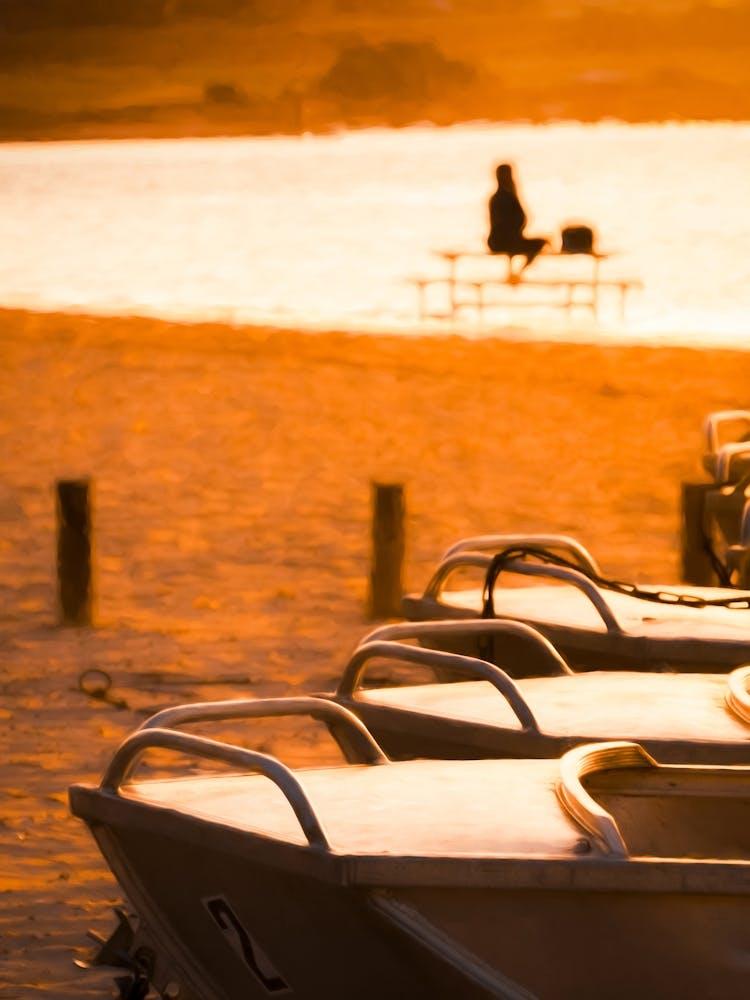 River Boats At Sunset