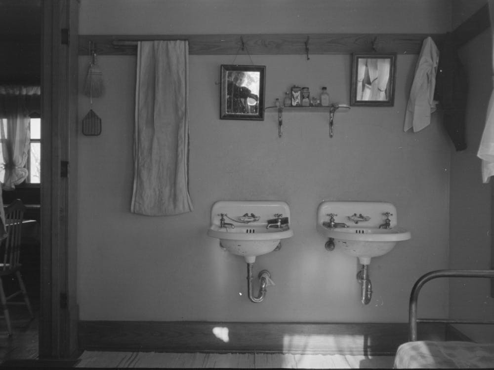 Washroom Of Rustan Brothers Farmhome Near Dickens, Iowa By Russell Lee