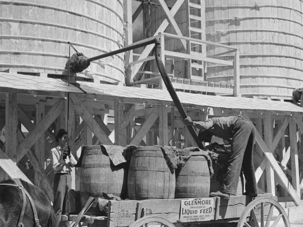Untitled Photo, Possibly Related To Loading Liquid Feed Onto Truck From Tanks At Distillery Near Owensboro