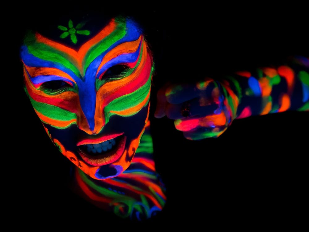 Woman With Make Up Art Of Glowing Uv Fluorescent Powder 10