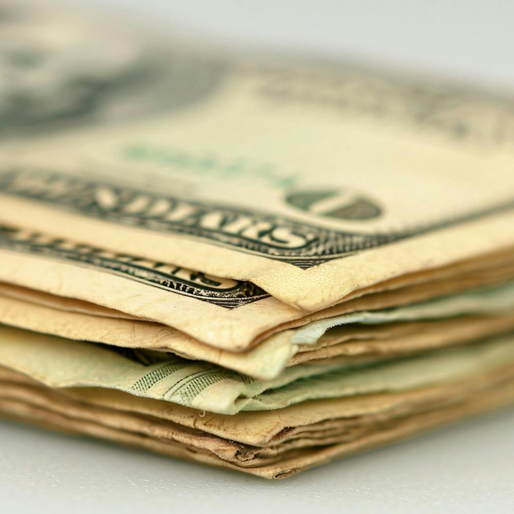 Stack Of Us Dollar Bills