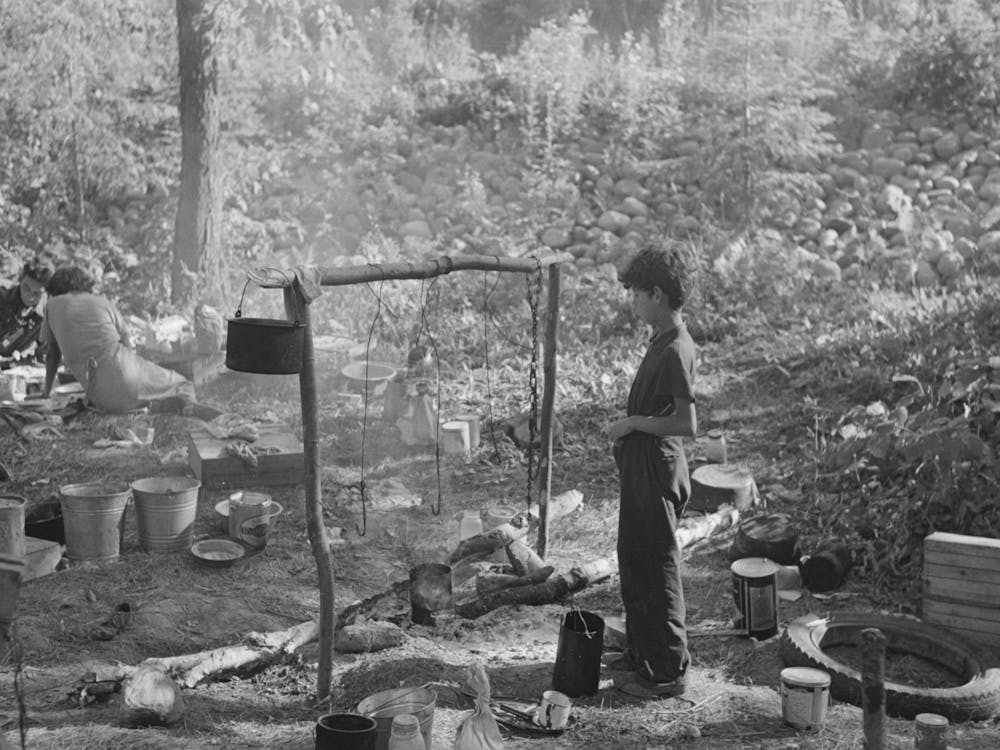 Indian Boy And Cooking Arrangement, Blueberry Camp Near Little Fork, Minnesota By Russell Lee