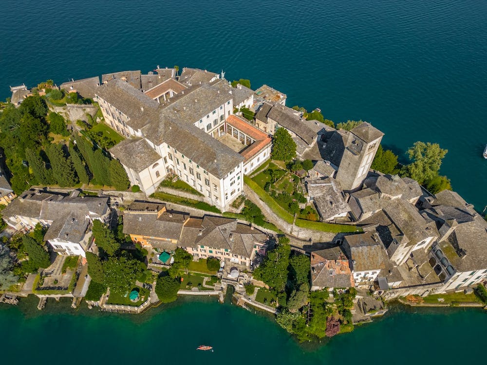 The famous island of San Giulia on Lake Orta Italy. drone view