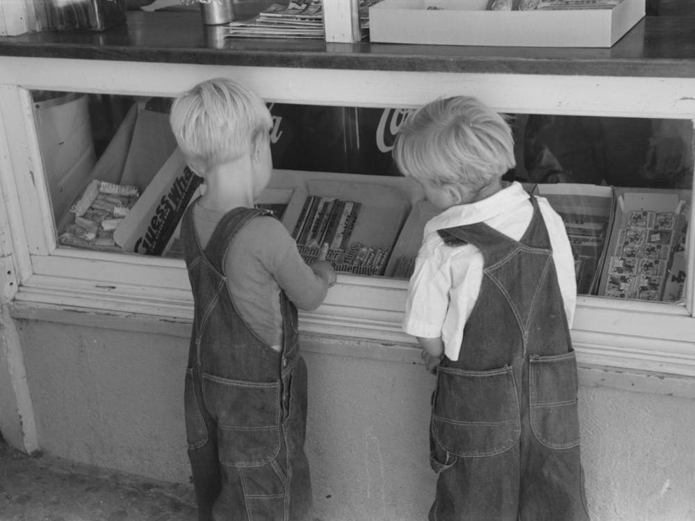 Little Boys Deciding What Kind Of Candy They Want To Buy, Caldwell, Idaho By Russell Lee