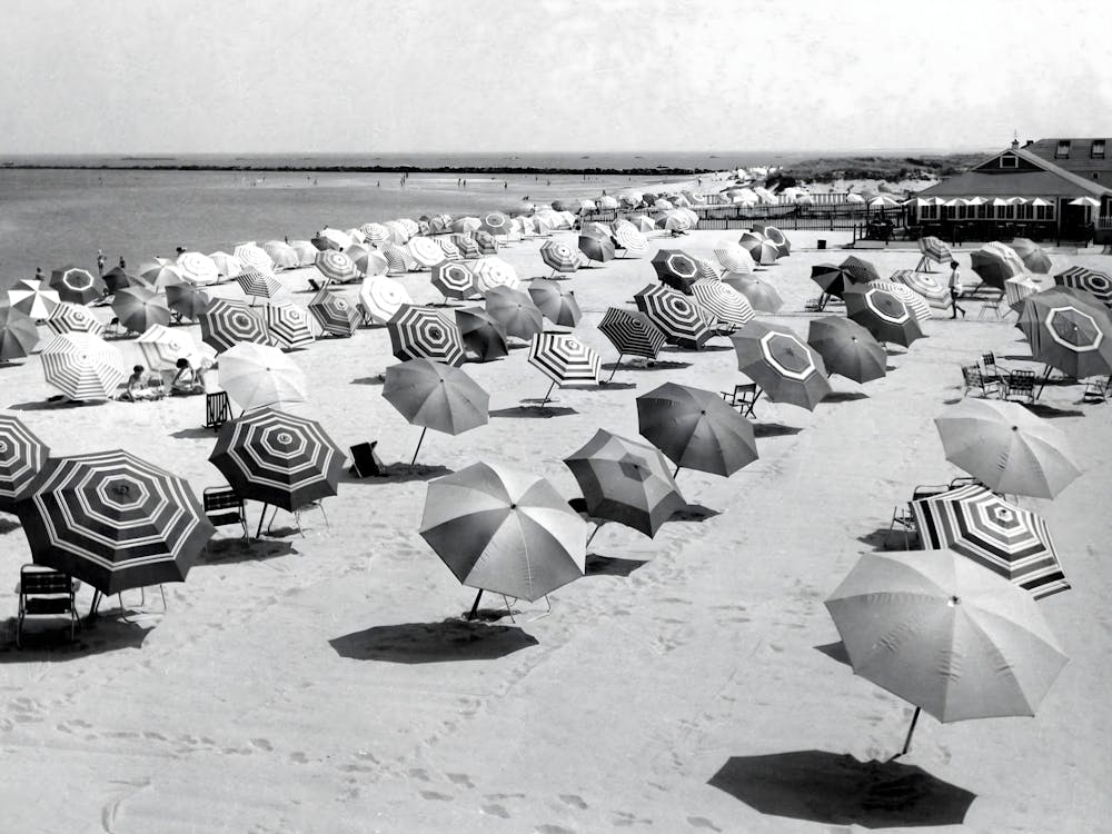 Umbrellas On The Beach, Vintage Black and White Old Photo
