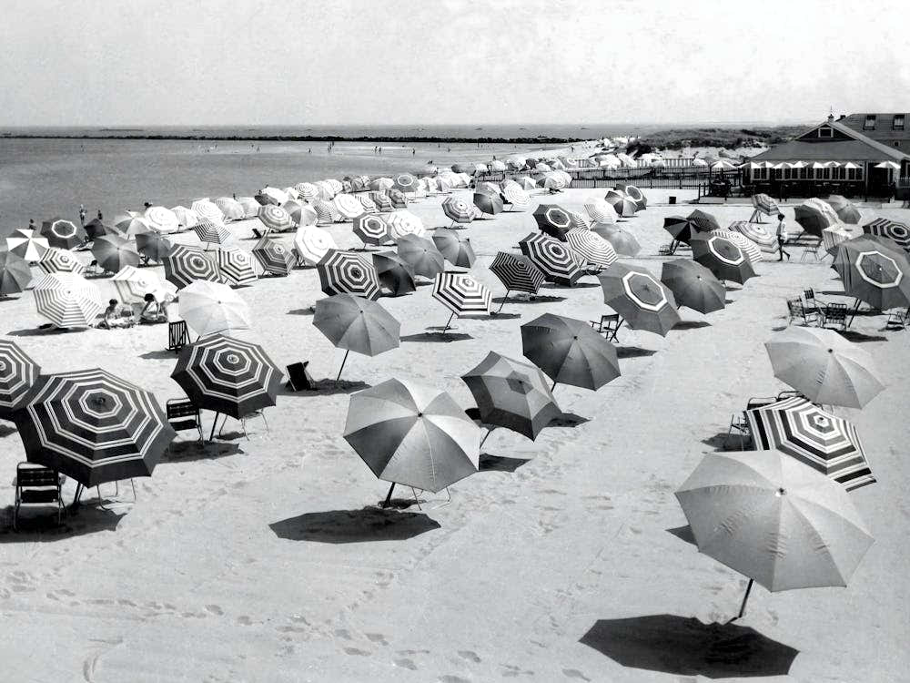 Umbrellas On The Beach, Vintage Black and White Old Photo