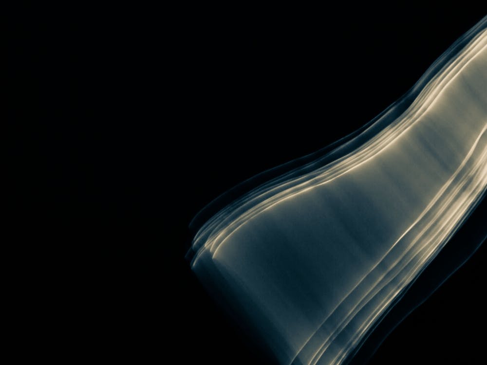 Glowing abstract curved blue and yellow lines 20