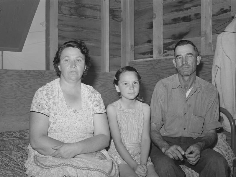 Migratory Farm Worker, His Wife And Daughter In Shelter At The Fsa (Farm Security Administration) Labor Camp