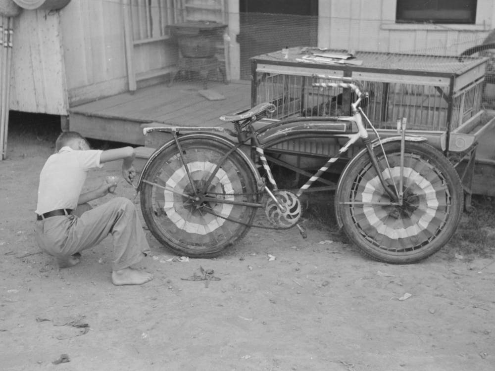 Untitled Photo, Possibly Related To Boy Decorating Bicycle For Entering Contest For Best Decorated Bicycle, National Ri